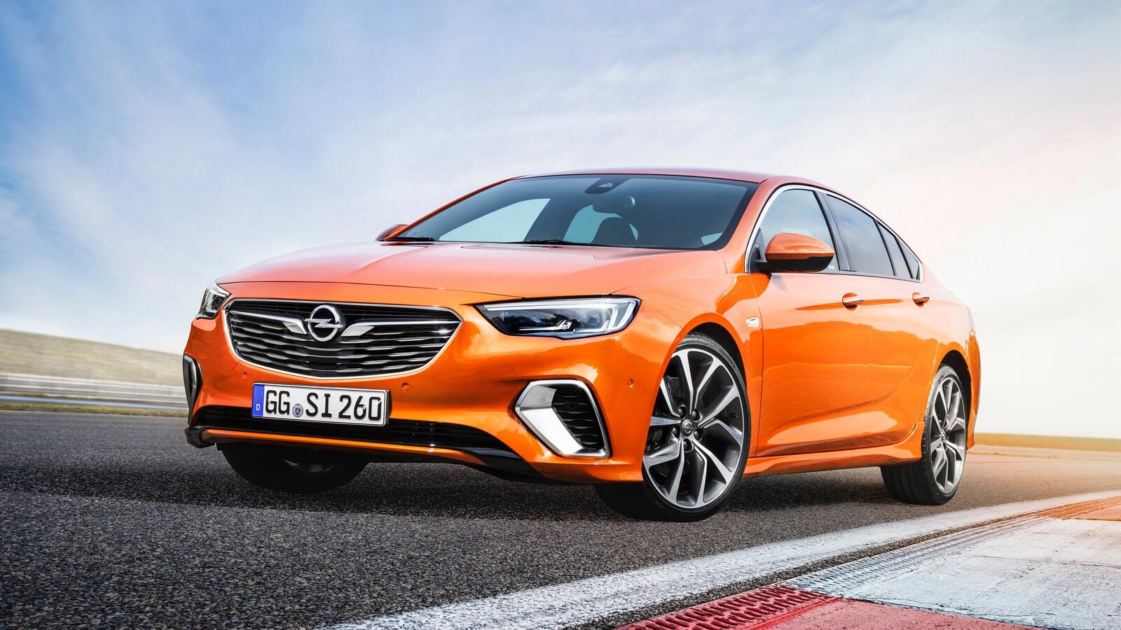 Wallpapers opel insignia orange car view from front on the desktop