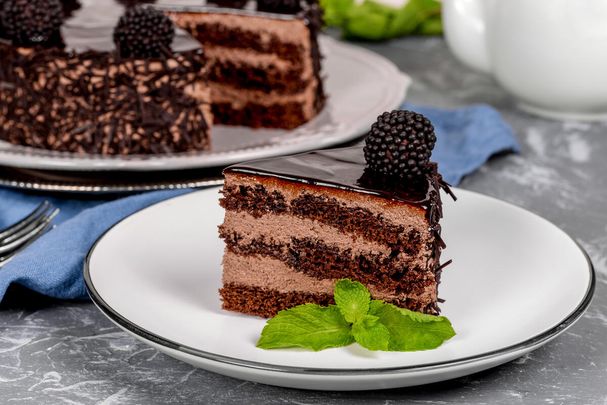 A piece of cake with blackberries