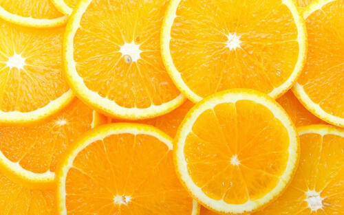 Желтые апельсинки в разрезе