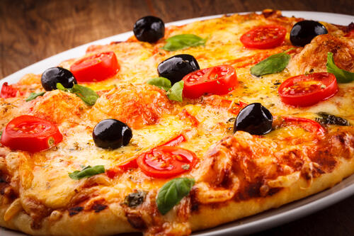Pizza with cheese and olives