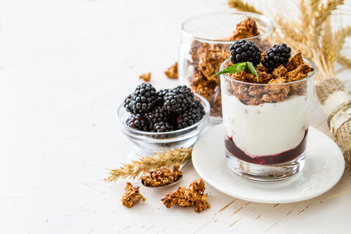 Dessert with nuts and blackberries