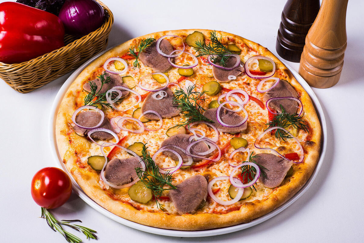 Pizza with meat and onions