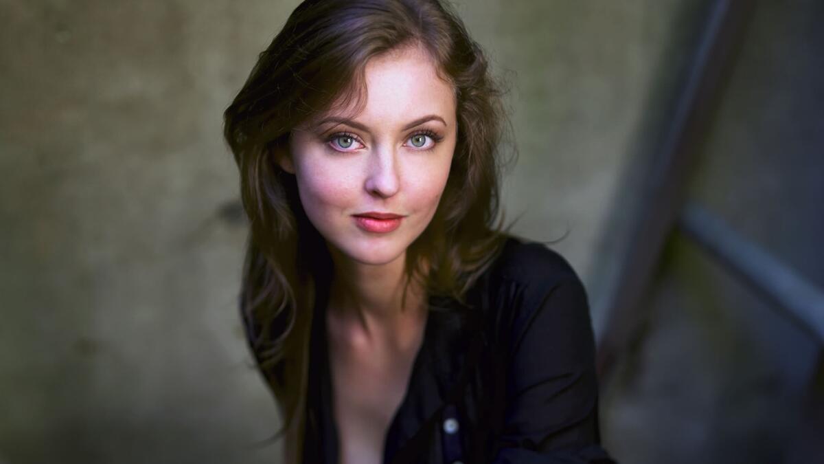 Beautiful brown-haired Katherine Isabelle