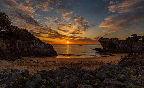Sunset on the rocky coast