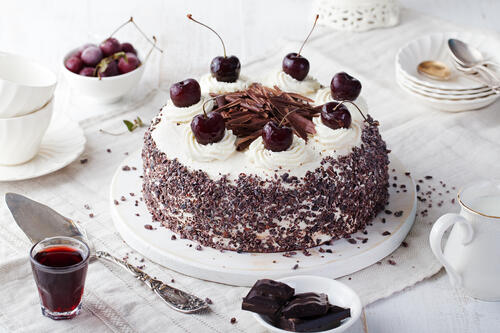 Cake with cherries and grated chocolate