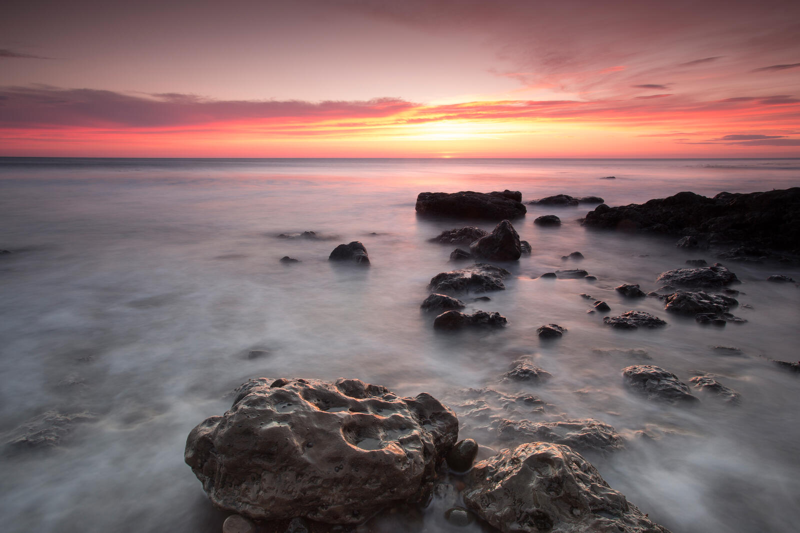 Free photo Sunset and rocks