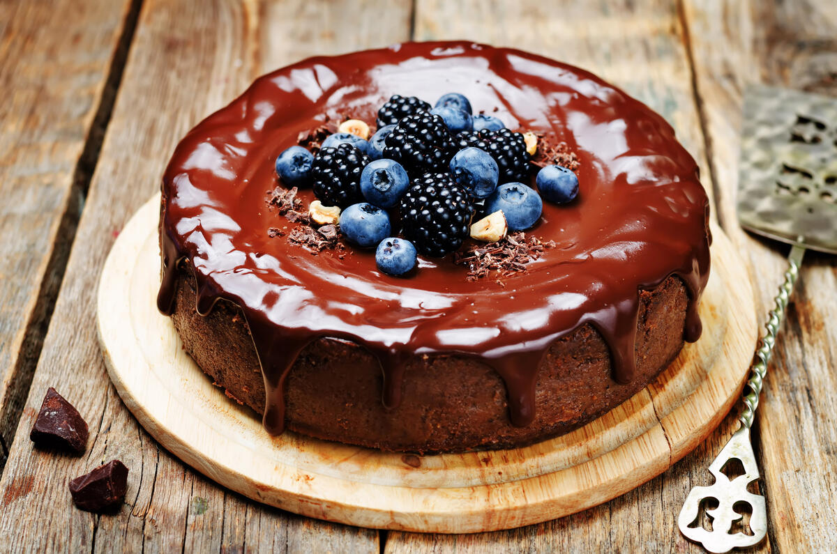 Cake with chocolate cream and berries