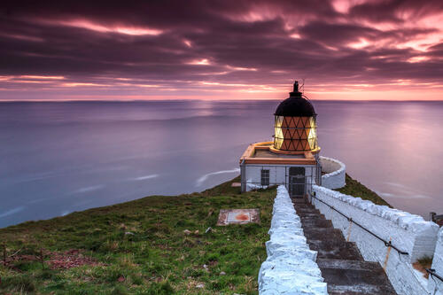 Lighthouse and night sea