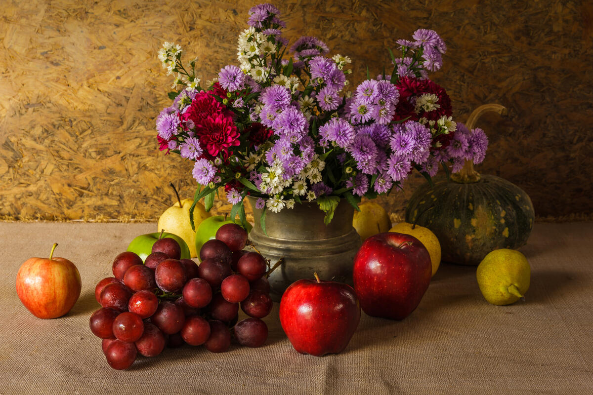Purple asters, grapes and apples