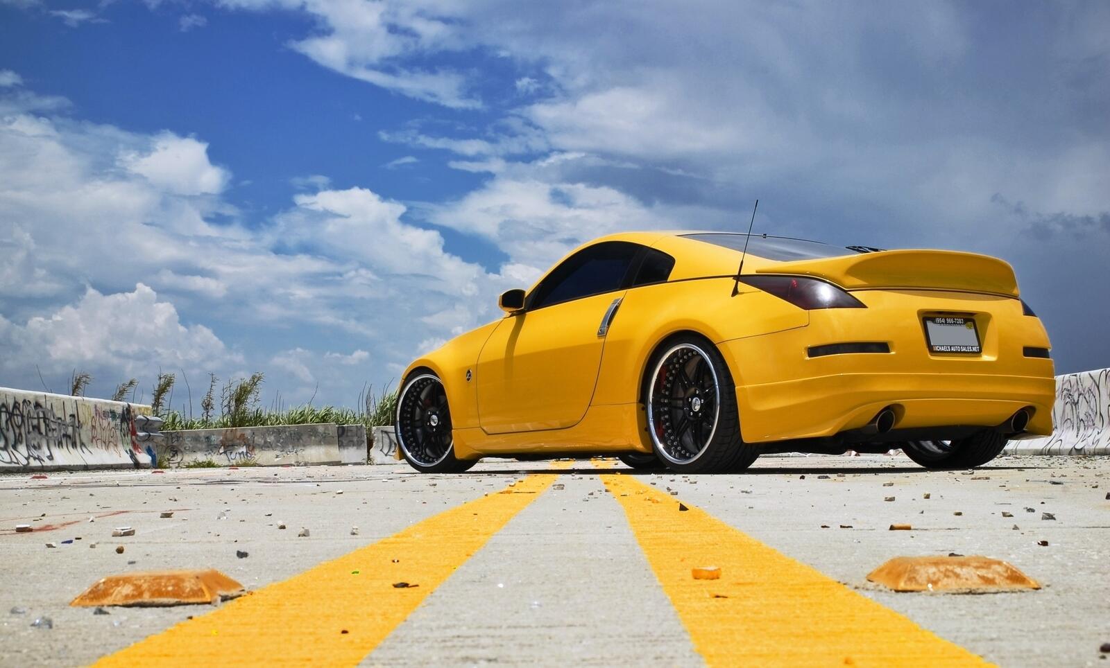 Wallpapers nissan 370z yellow at the training ground on the desktop