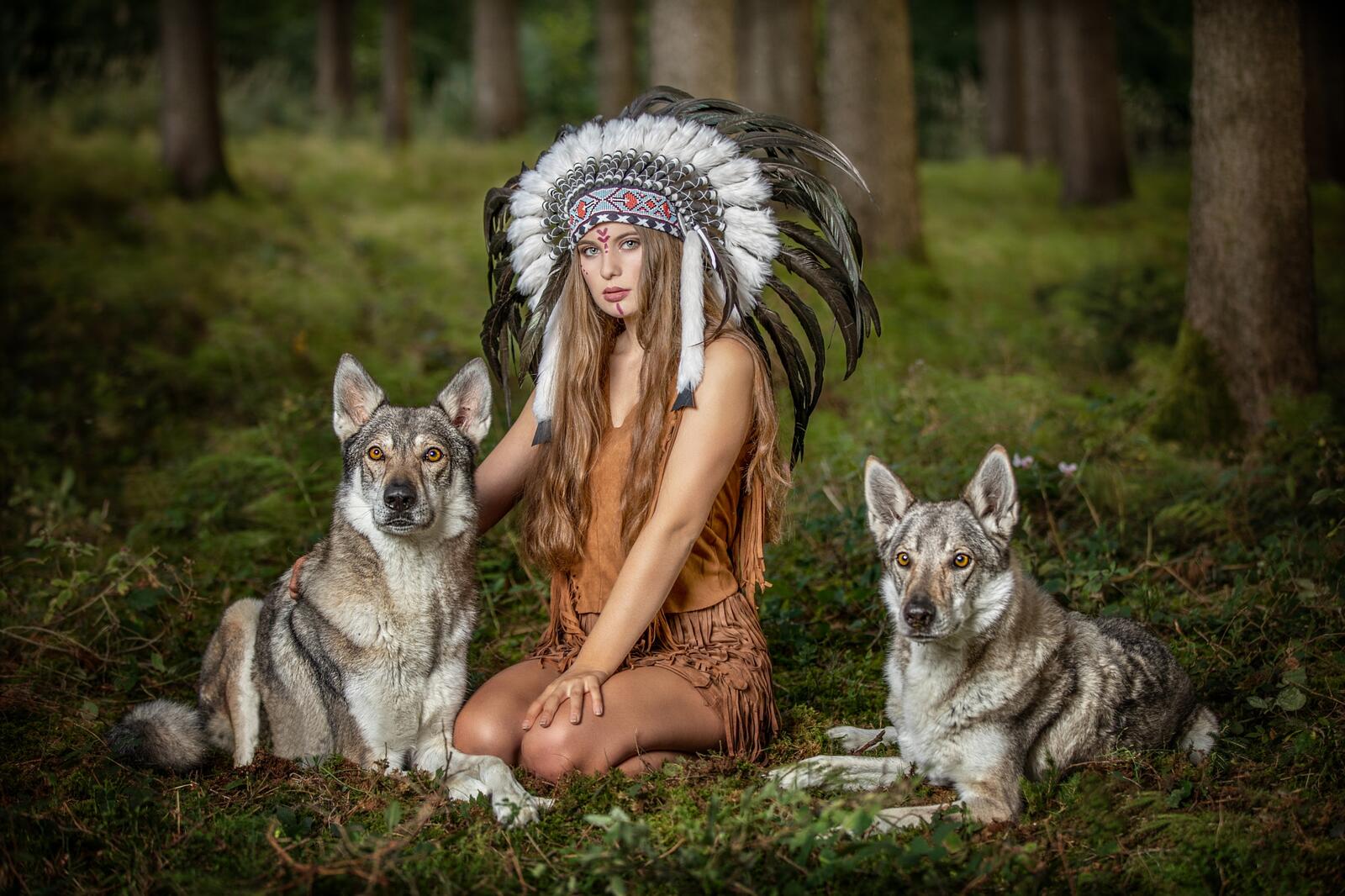 Бесплатное фото Девушка индеец и волки