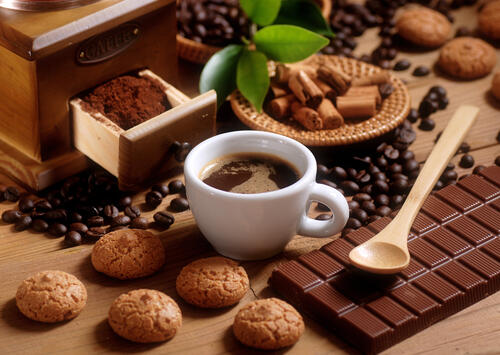 Coffee with cookies and chocolate