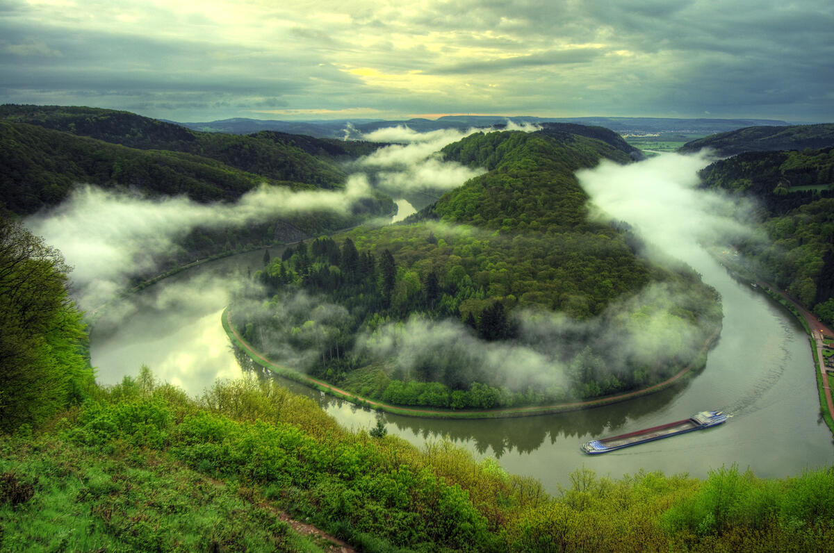 Bend of the Saar River and fog over the river