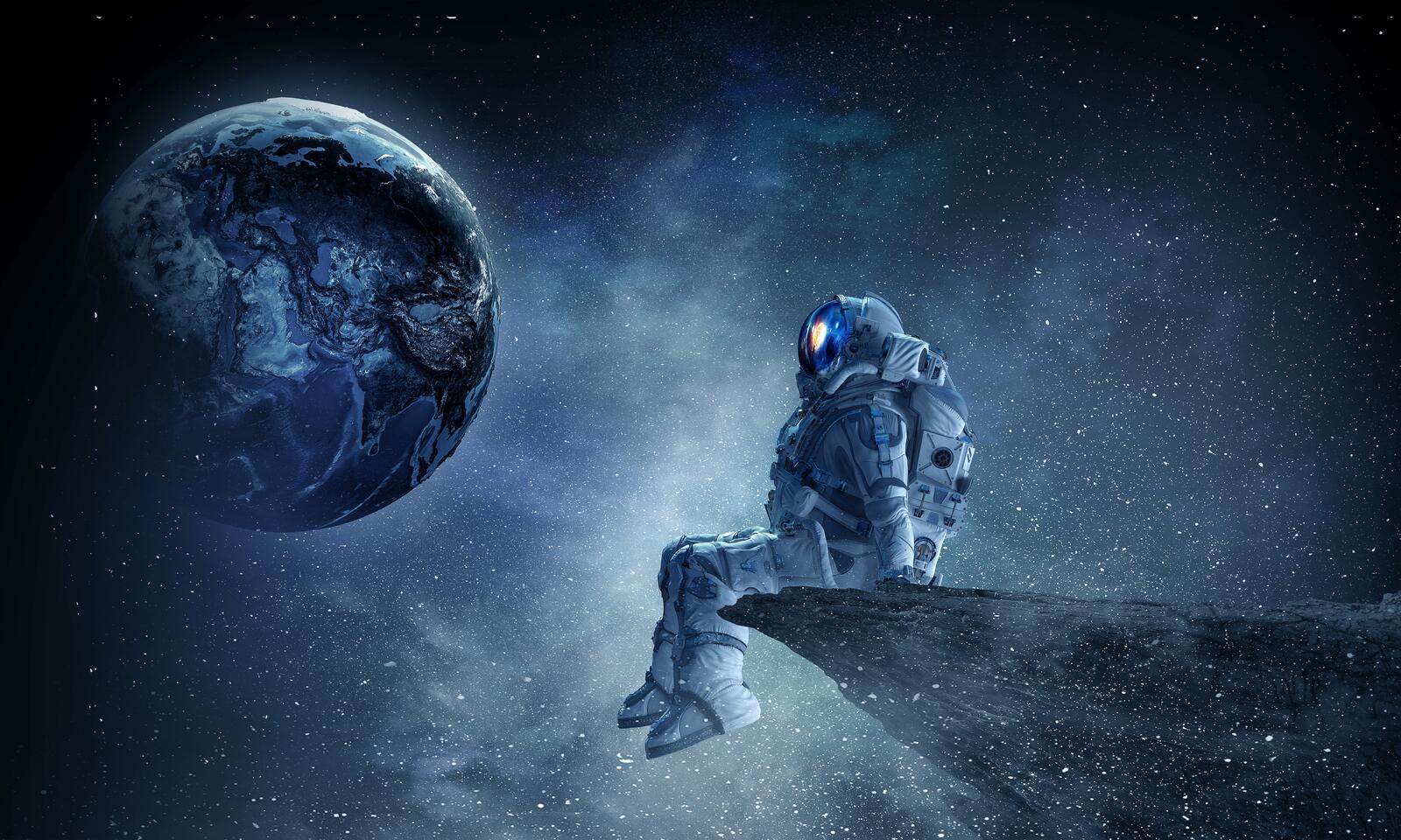 Обои космонавт скалы планеты на рабочий стол
