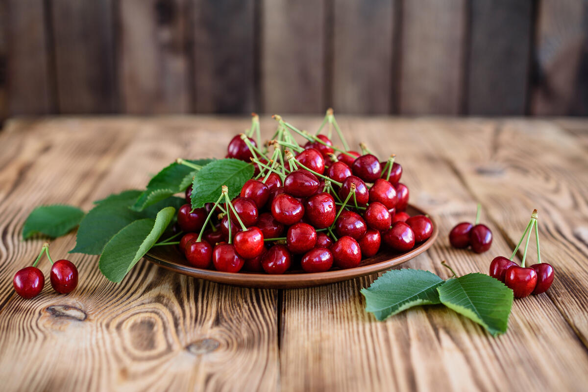 Plate with tasty cherries
