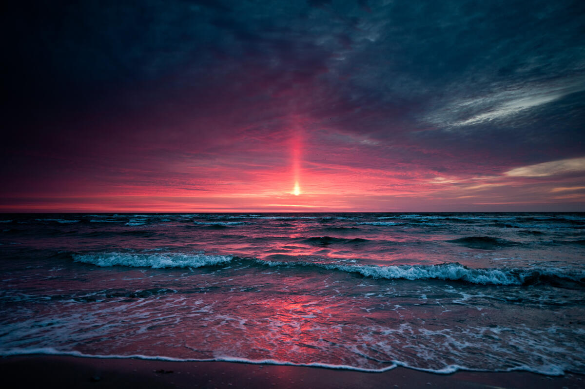 Pink evening on the sea shore