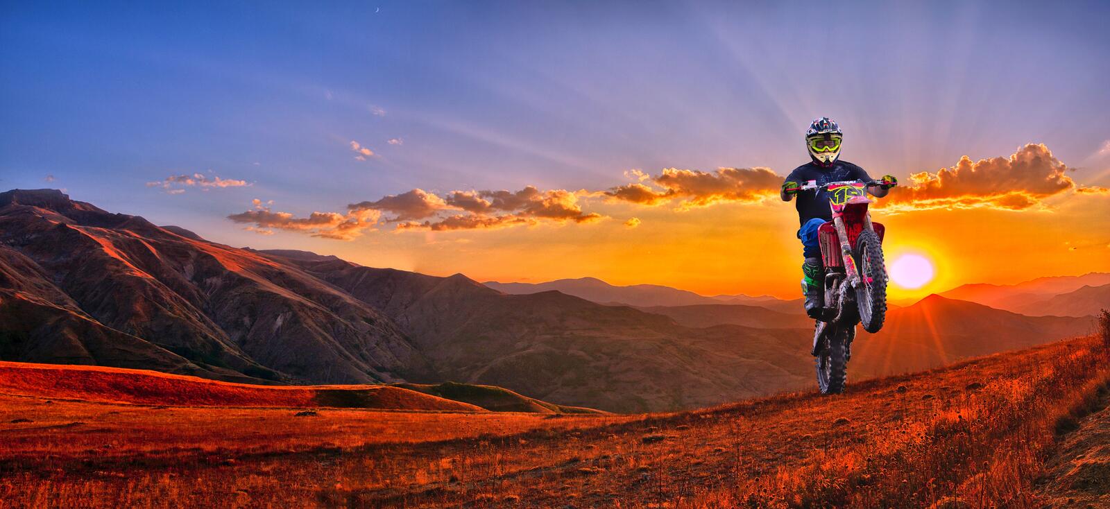 Wallpapers sunset mountains motorcyclist on the desktop
