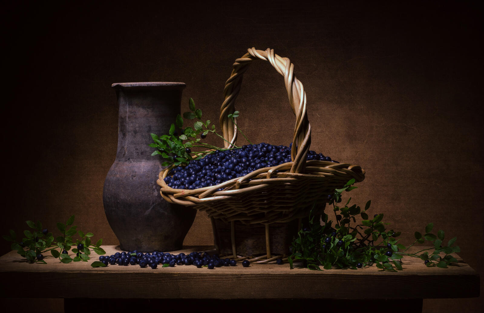 Free photo Still life with blueberries and Jug