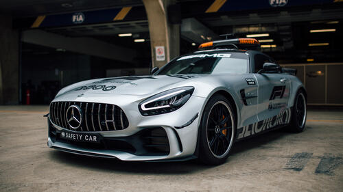 Mercedes AMG GT C with flashing lights leaves the tunnel