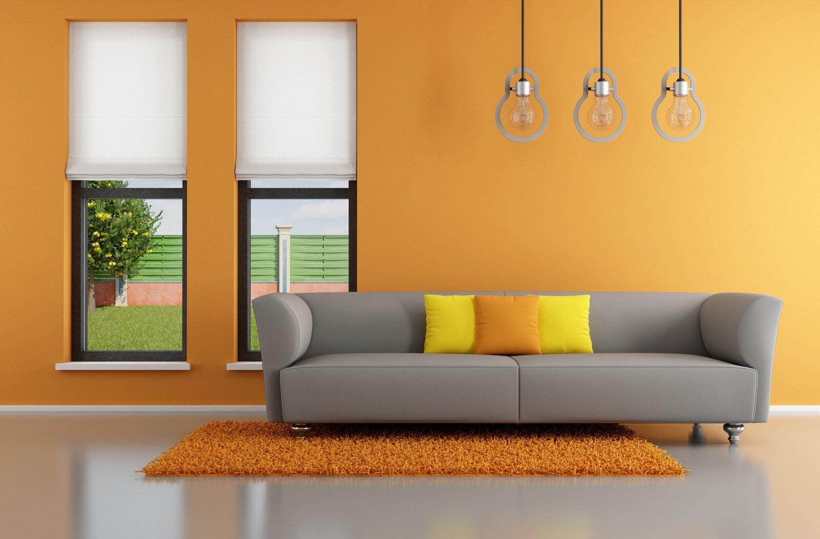 Бесплатное фото Минималистичный интерьер оранжевой комнаты
